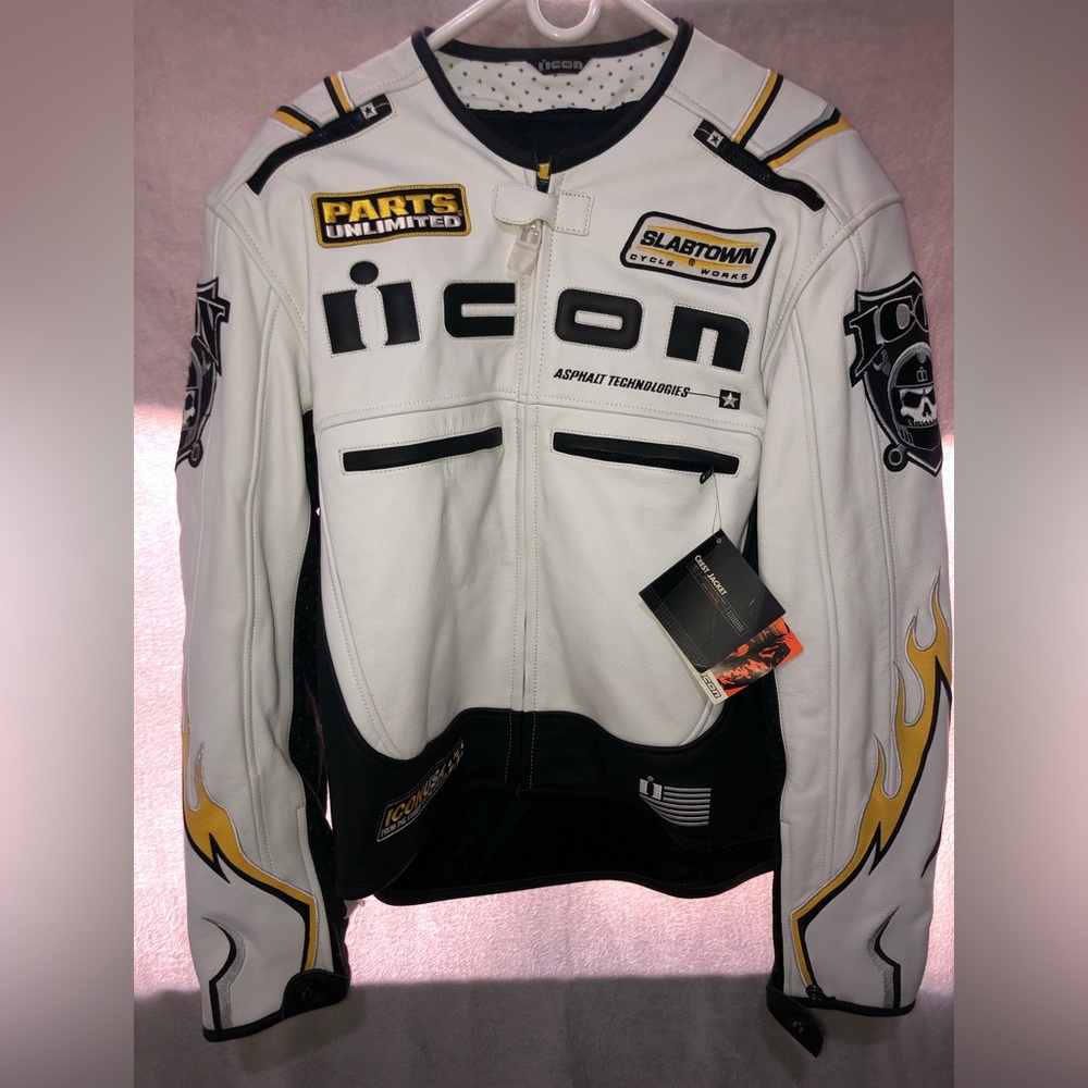 Icon Crest Jacket , Genuine Leather lining, 100% Polyester. New with tags.